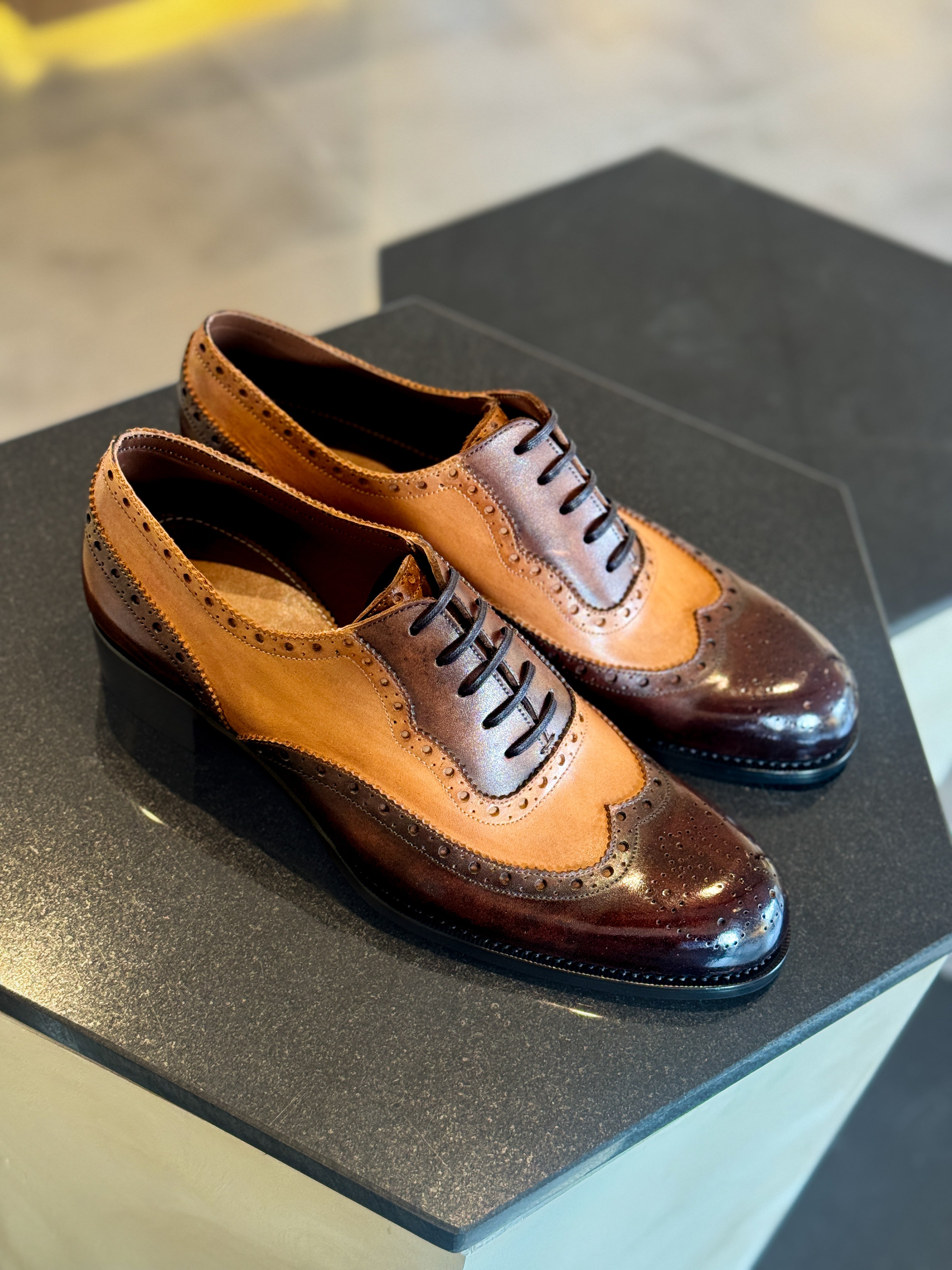 Chestnut brown wingtip oxfords