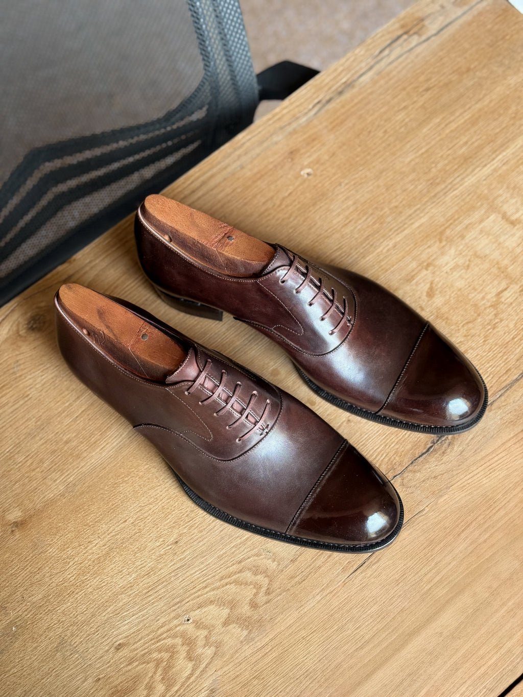 Dark brown cap-toe oxfords