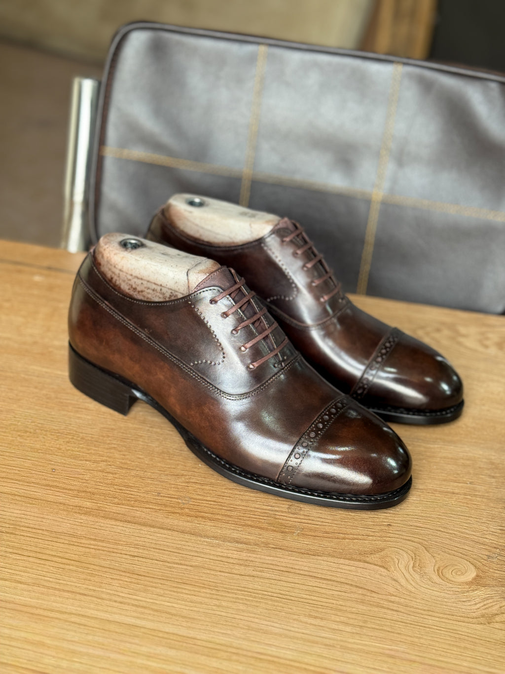 Chocolate brown patina captoe oxfords