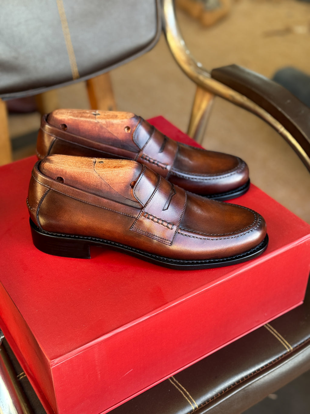 Brown patina penny loafers