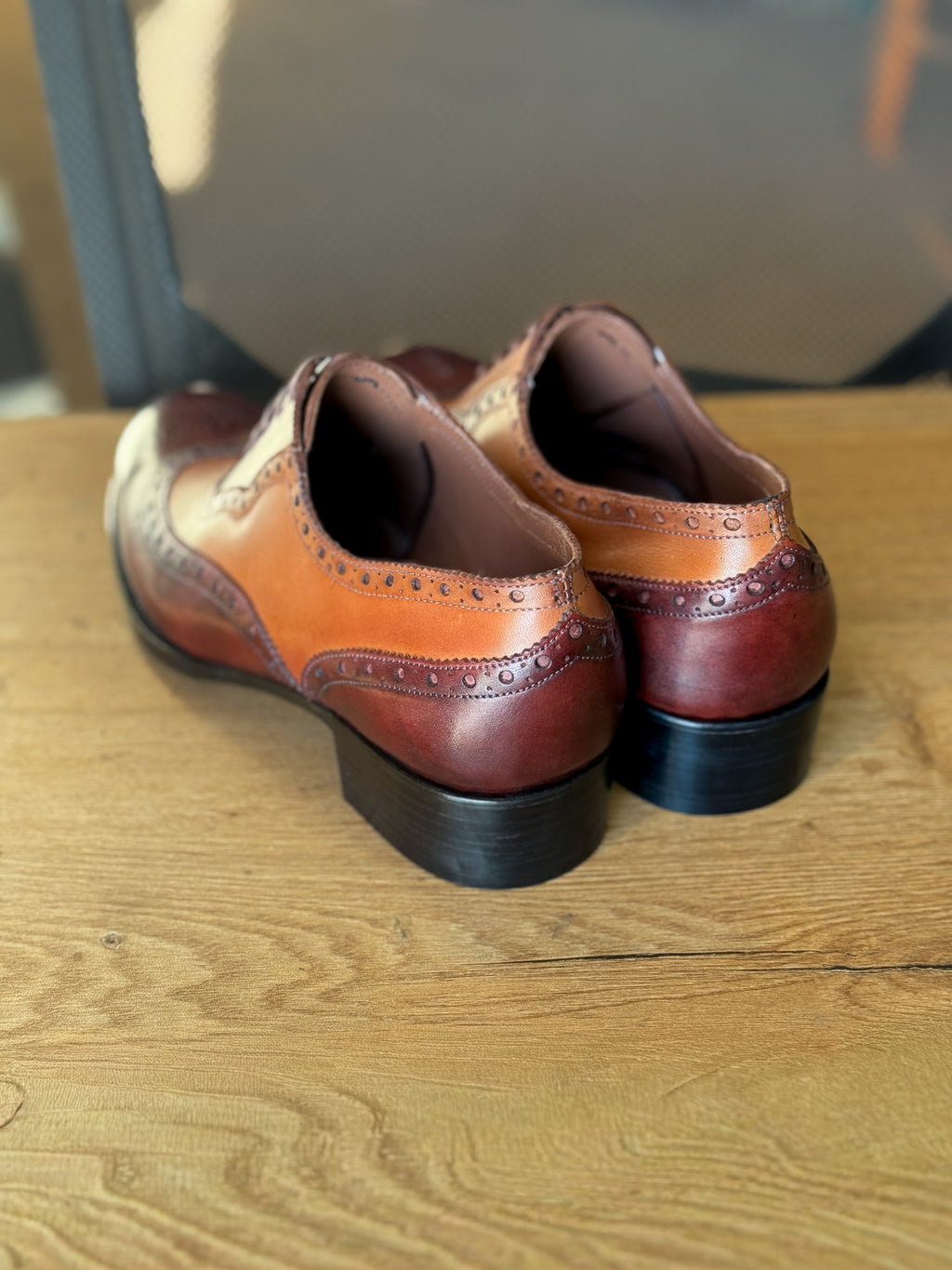 Burgundy chestnut wingtip oxfords
