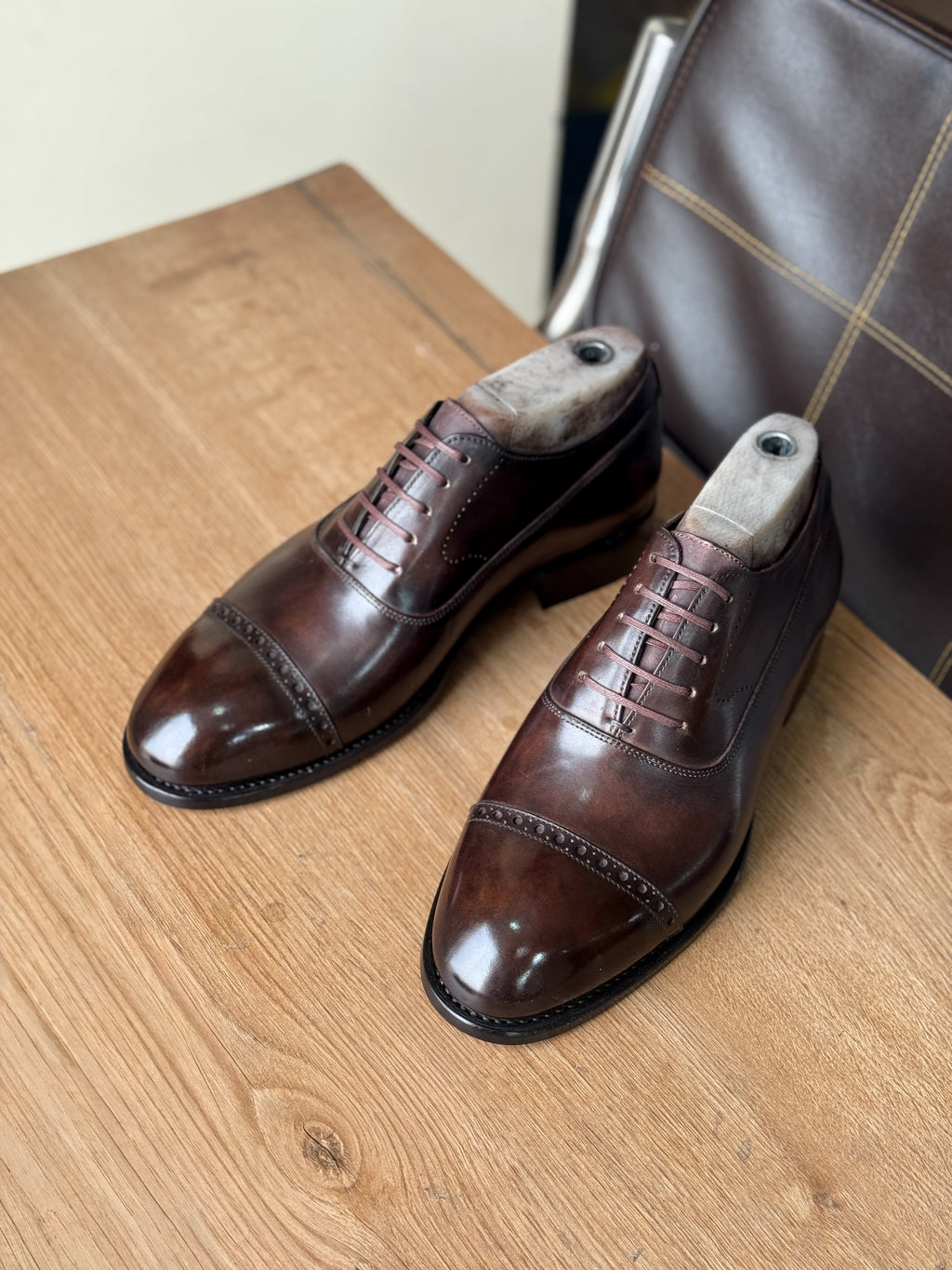 Chocolate brown patina captoe oxfords