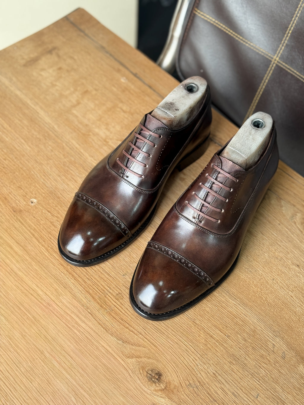Chocolate brown patina captoe oxfords