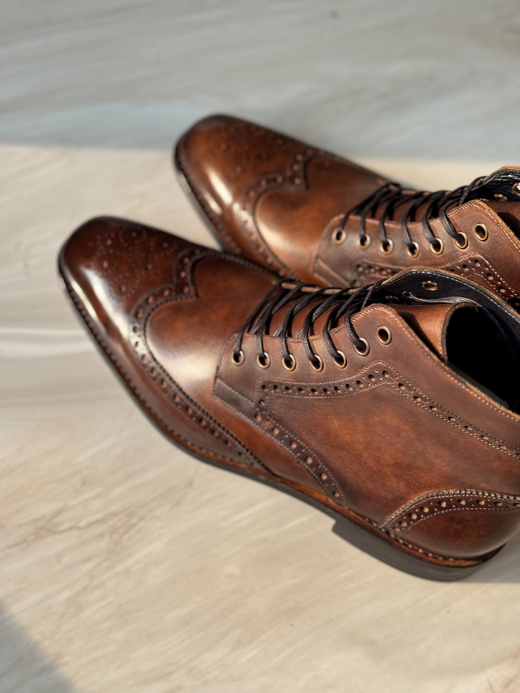 chestnut brown Wingtip Boots