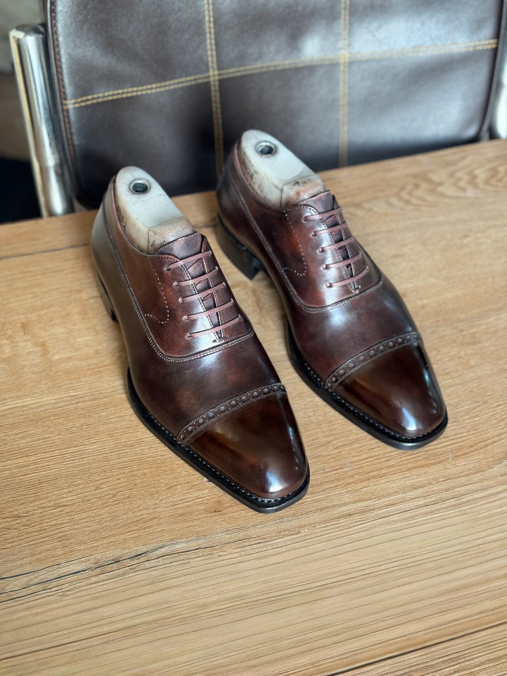Chocolate brown patina captoe oxfords
