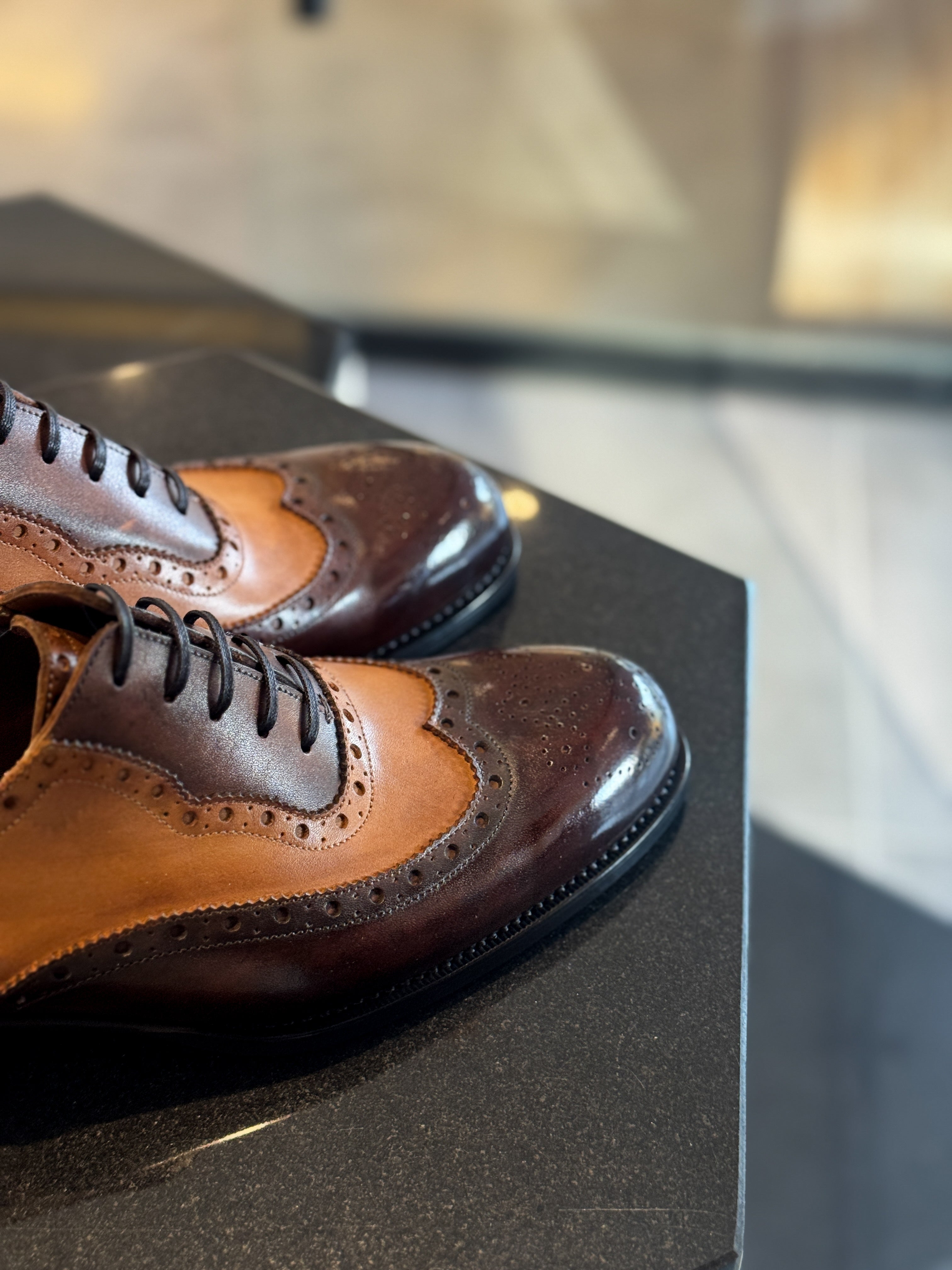 Chestnut brown wingtip oxfords