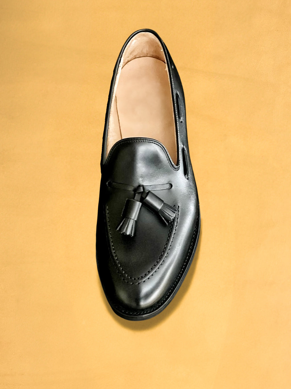 black tassle loafer