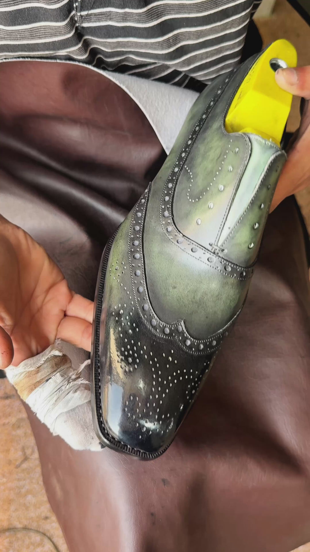 Emerald green and black patina wingtip oxfords